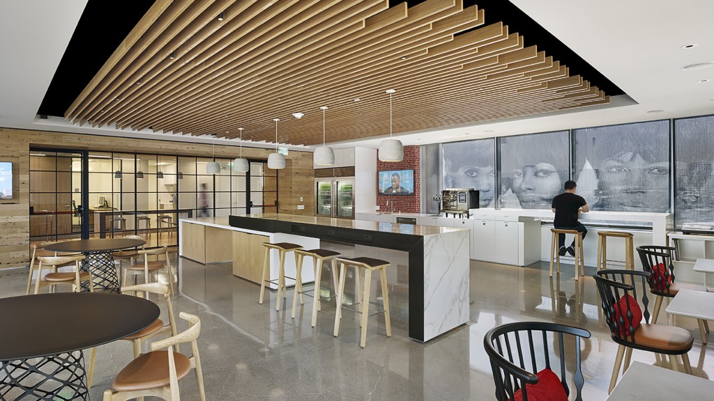 A room with tables and chairs.